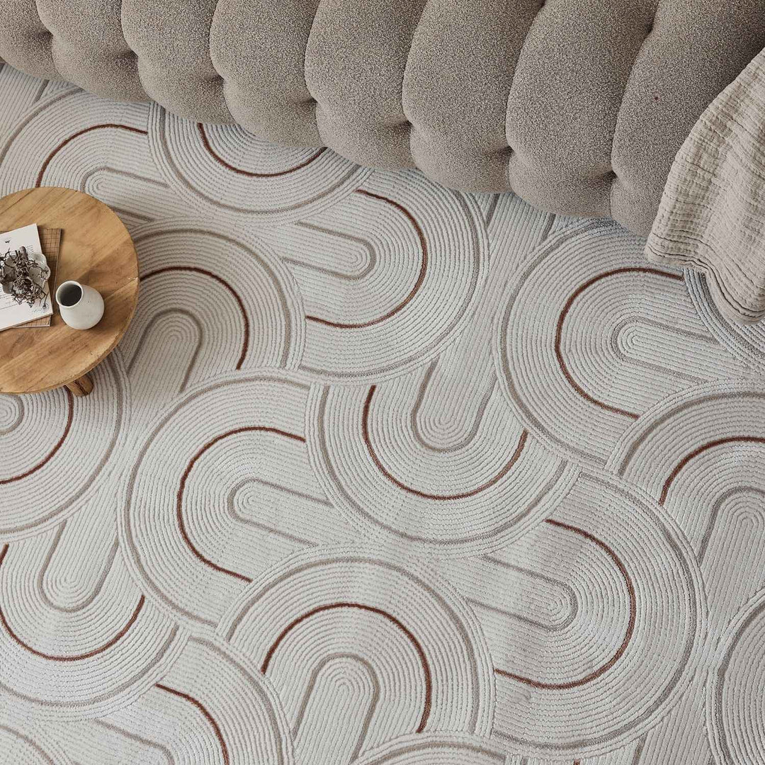 Living Room rug, terra-cream colours, geometric, practicality in mind, the rug is anti-allergic.