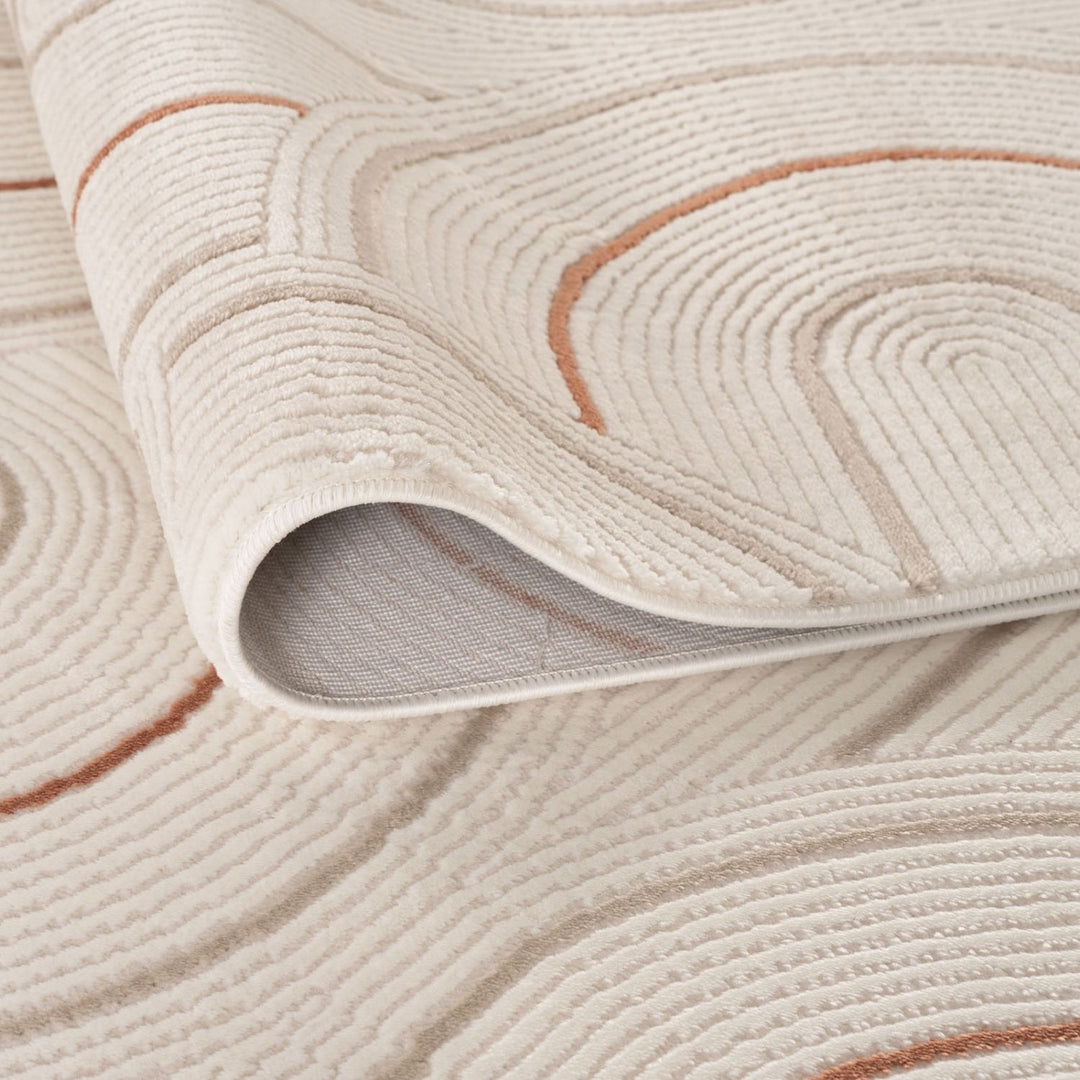 Living Room rug, terra-cream colours, geometric, practicality in mind, the rug is anti-allergic.