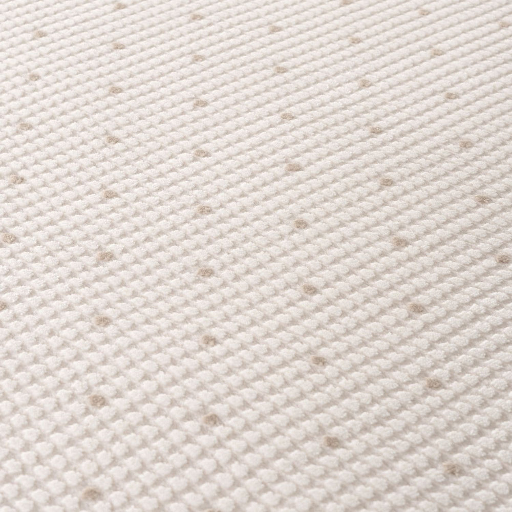 Living Room rug, beige-cream colours, dots, practicality in mind, the rug is anti-allergic.