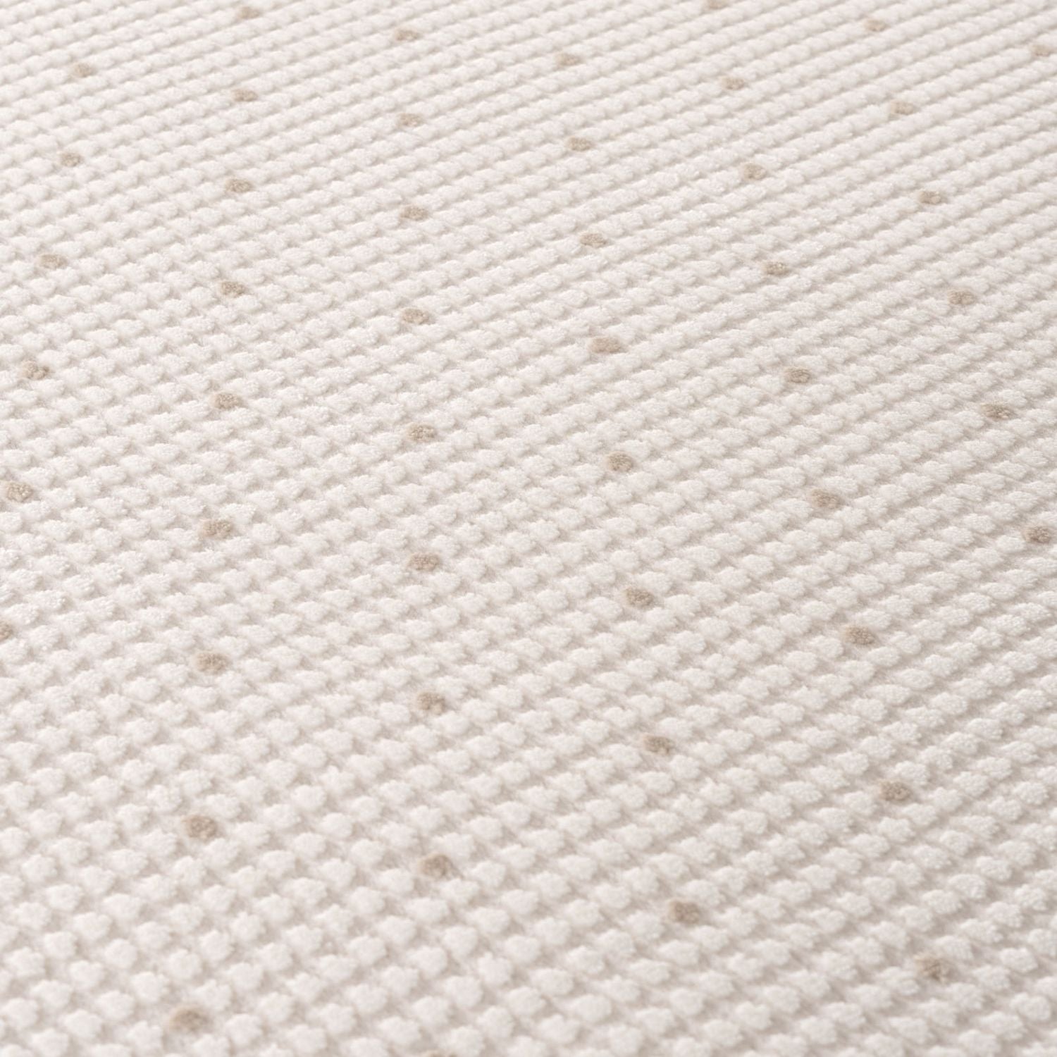 Living Room rug, beige-cream colours, dots, practicality in mind, the rug is anti-allergic.