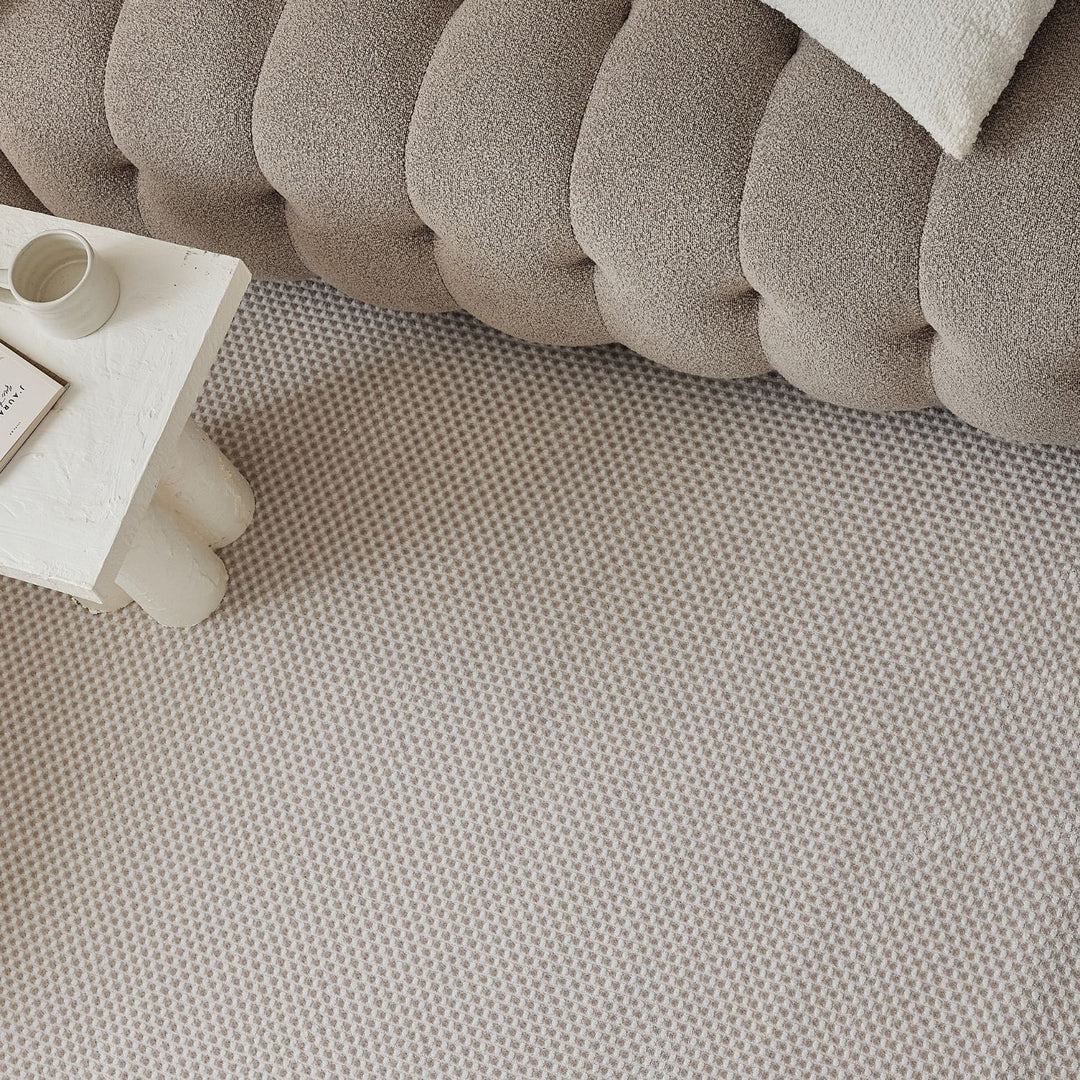 Living Room rug, beige-cream colours, dots, practicality in mind, the rug is anti-allergic.