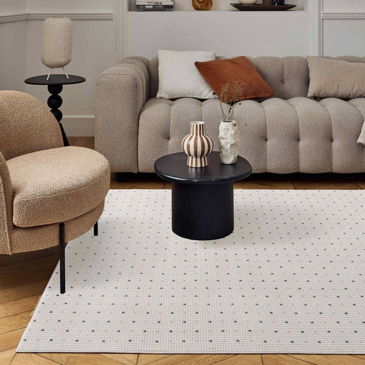Living Room rug, blue-cream colours, dots, practicality in mind, the rug is anti-allergic.