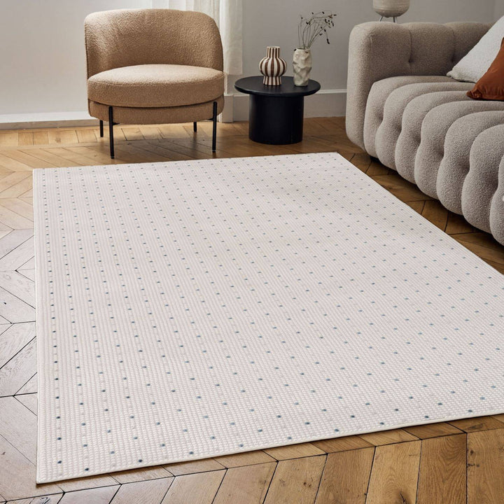 Living Room rug, blue-cream colours, dots, practicality in mind, the rug is anti-allergic.