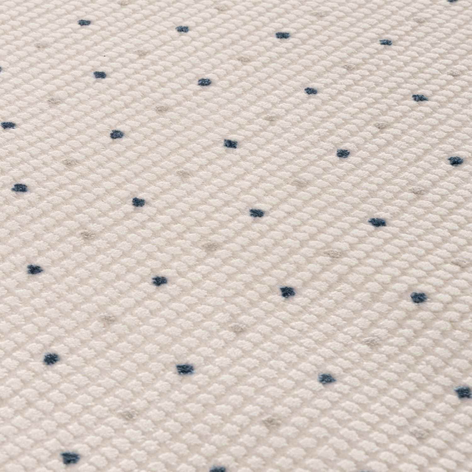 Living Room rug, blue-cream colours, dots, practicality in mind, the rug is anti-allergic.