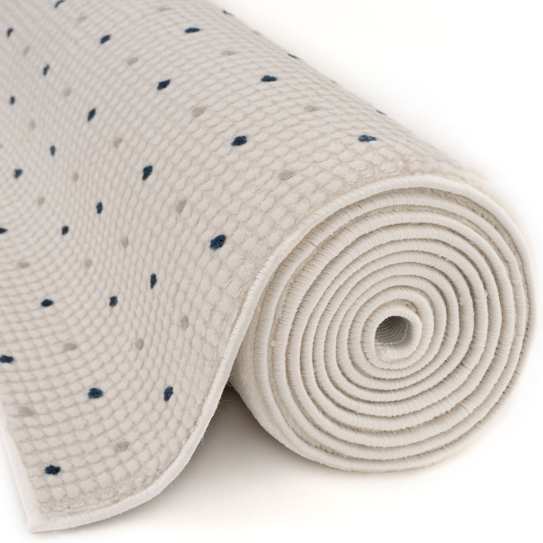 Living Room rug, blue-cream colours, dots, practicality in mind, the rug is anti-allergic.