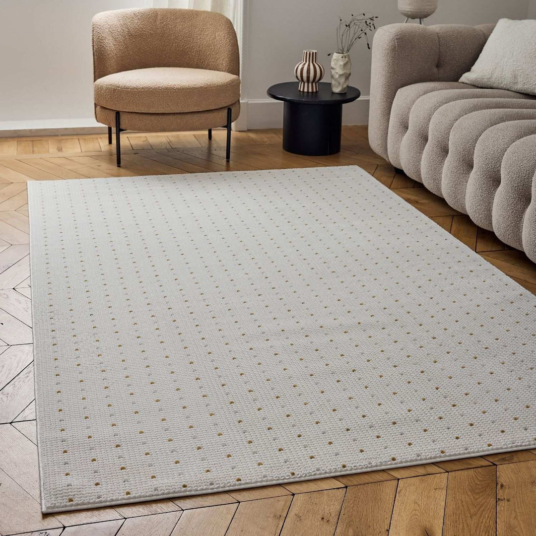 Living Room Rug, gold-cream colors, durability and underfoot comfort.