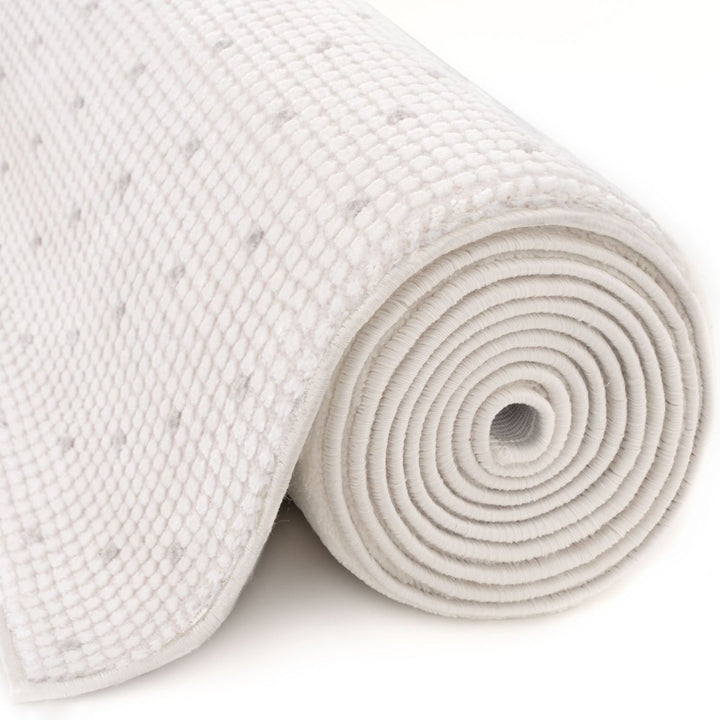 Living Room rug, grey-cream colours, dots, practicality in mind, the rug is anti-allergic.
