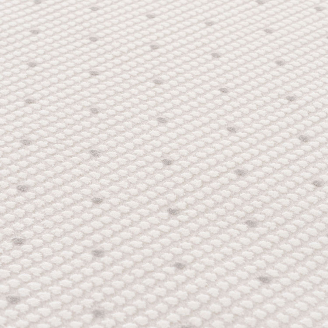 Living Room rug, grey-cream colours, dots, practicality in mind, the rug is anti-allergic.