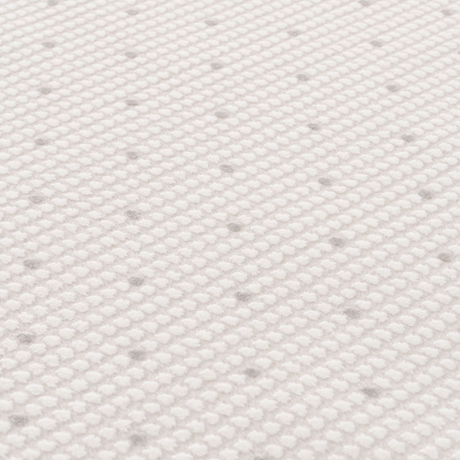 Living Room rug, grey-cream colours, dots, practicality in mind, the rug is anti-allergic.