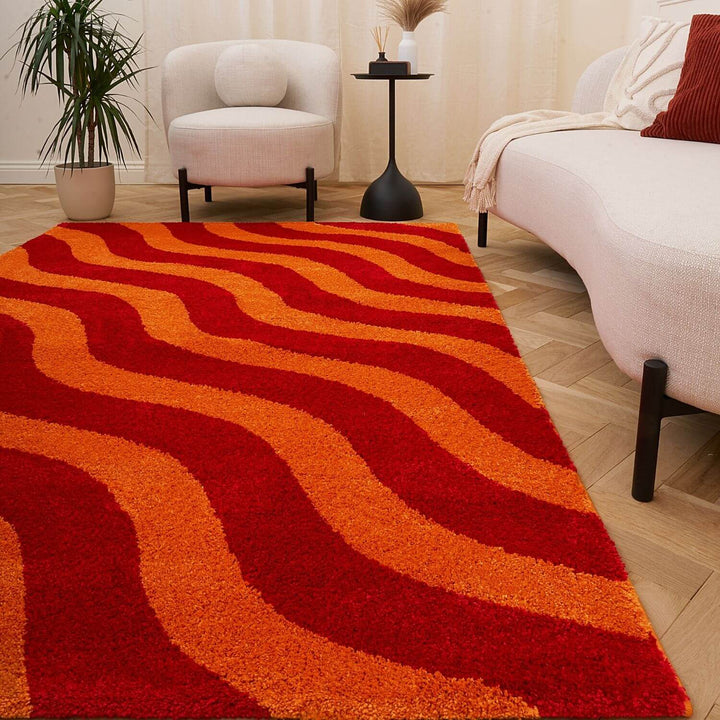 Red and orange wavy patterned rug
