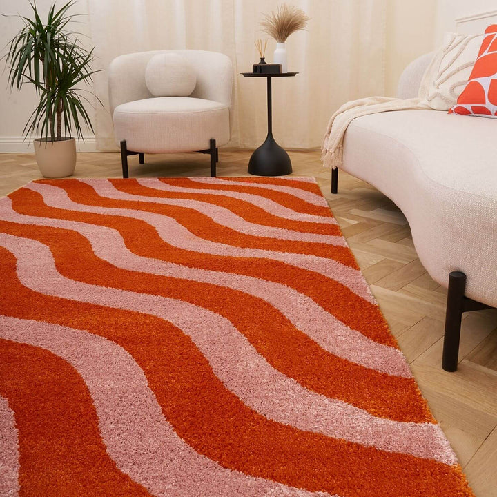 Patterned orange and pink fabric texture