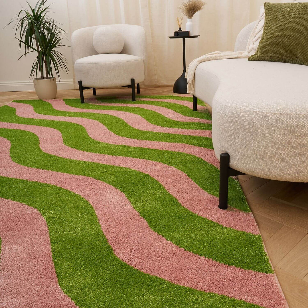 Wavy patterned fabric with green and pink wavy lines