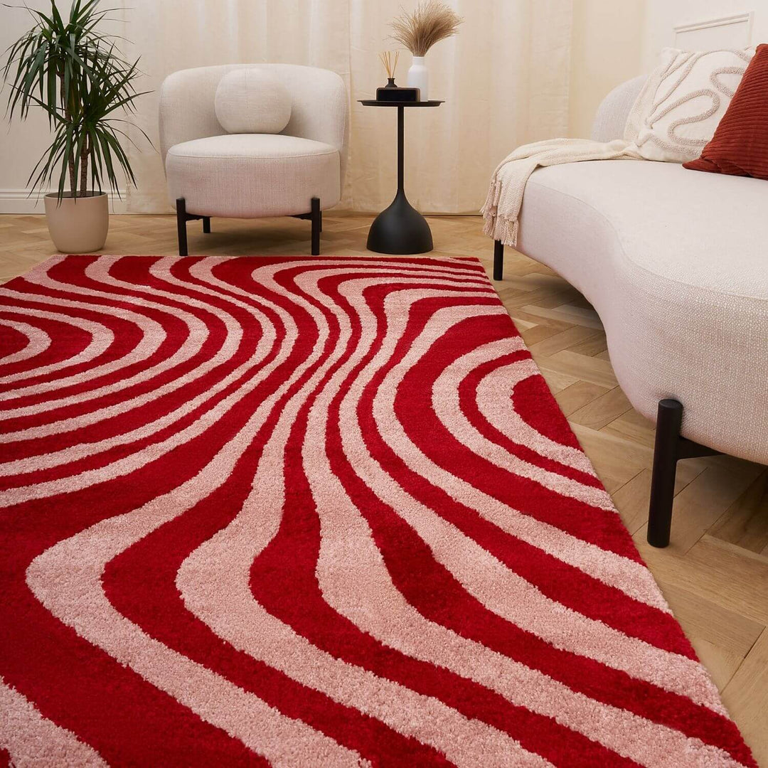 Red and pink wavy striped patterned rug