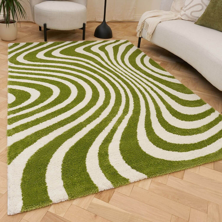 Rug with green and white wavy pattern