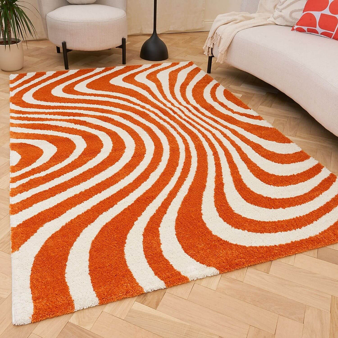 Patterned fabric with orange and white wavy lines