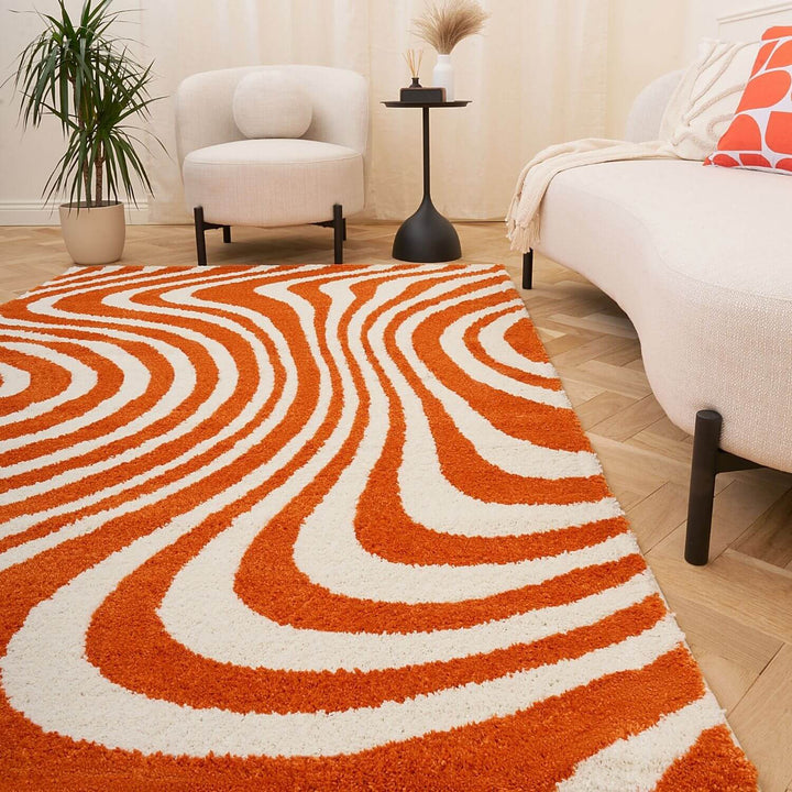 Patterned fabric with orange and white wavy lines