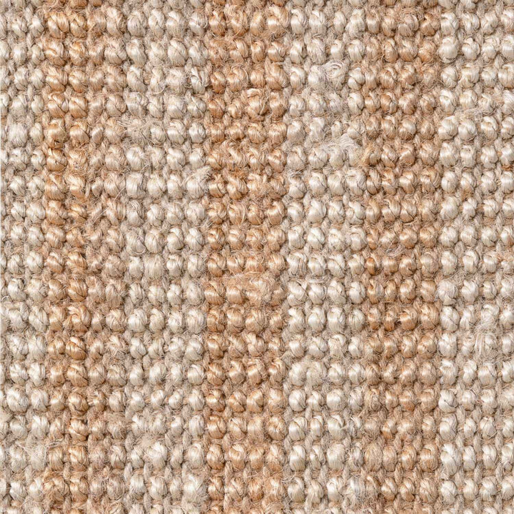 Close-up of beige and brown striped carpet texture