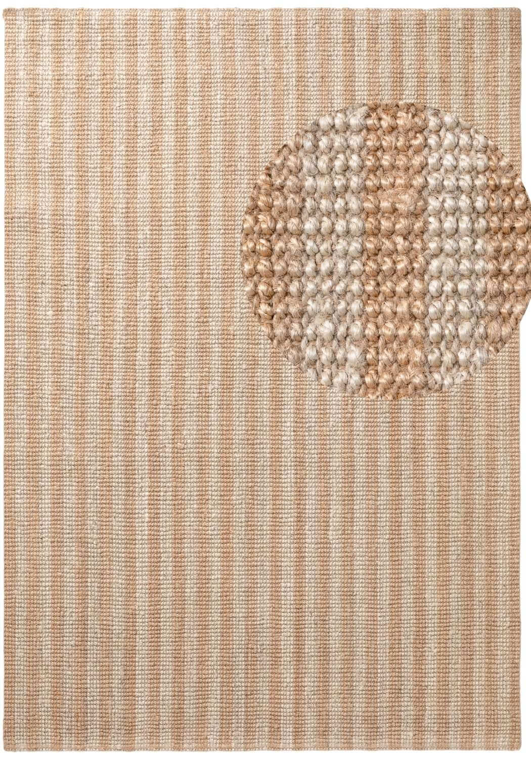 Textured rug with a circular pattern in a neutral color palette