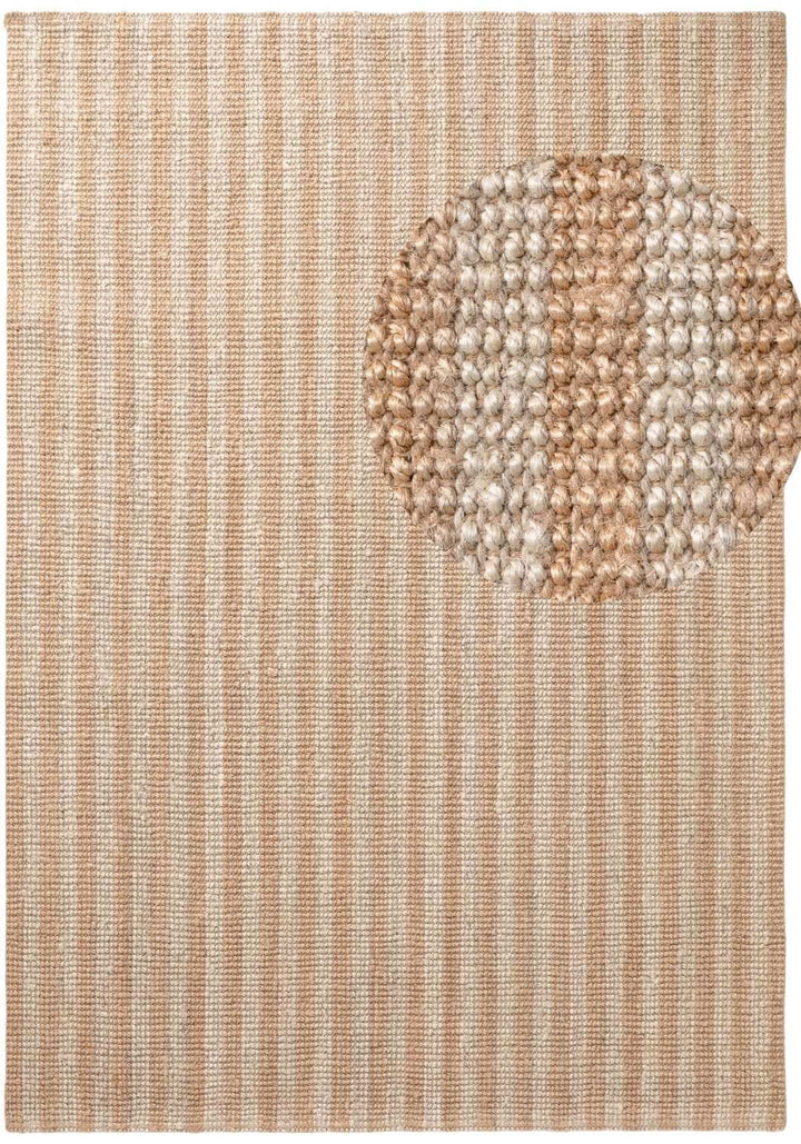Textured rug with a circular pattern in a neutral color palette