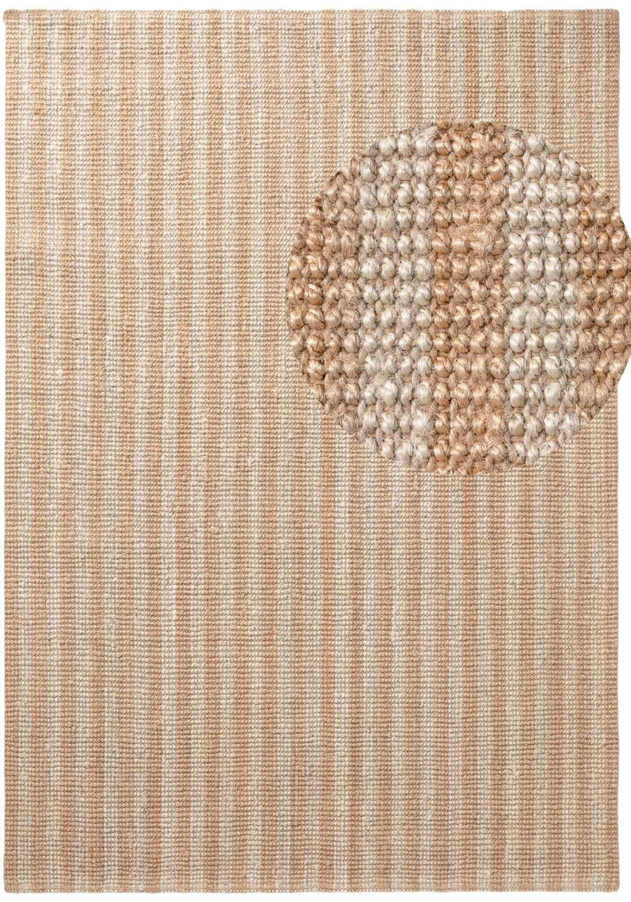 Textured rug with a circular pattern in a neutral color palette