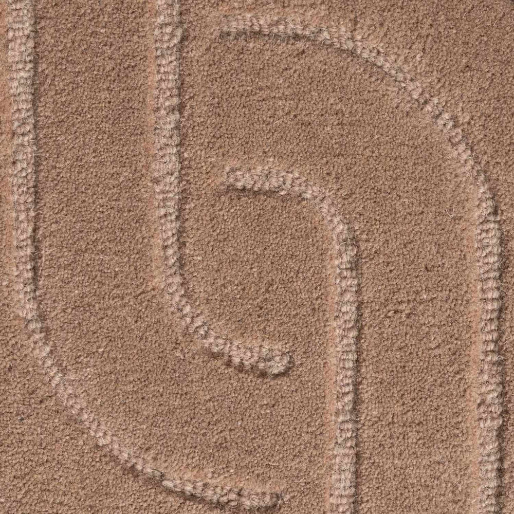 Close-up of a textured brown surface with a pattern