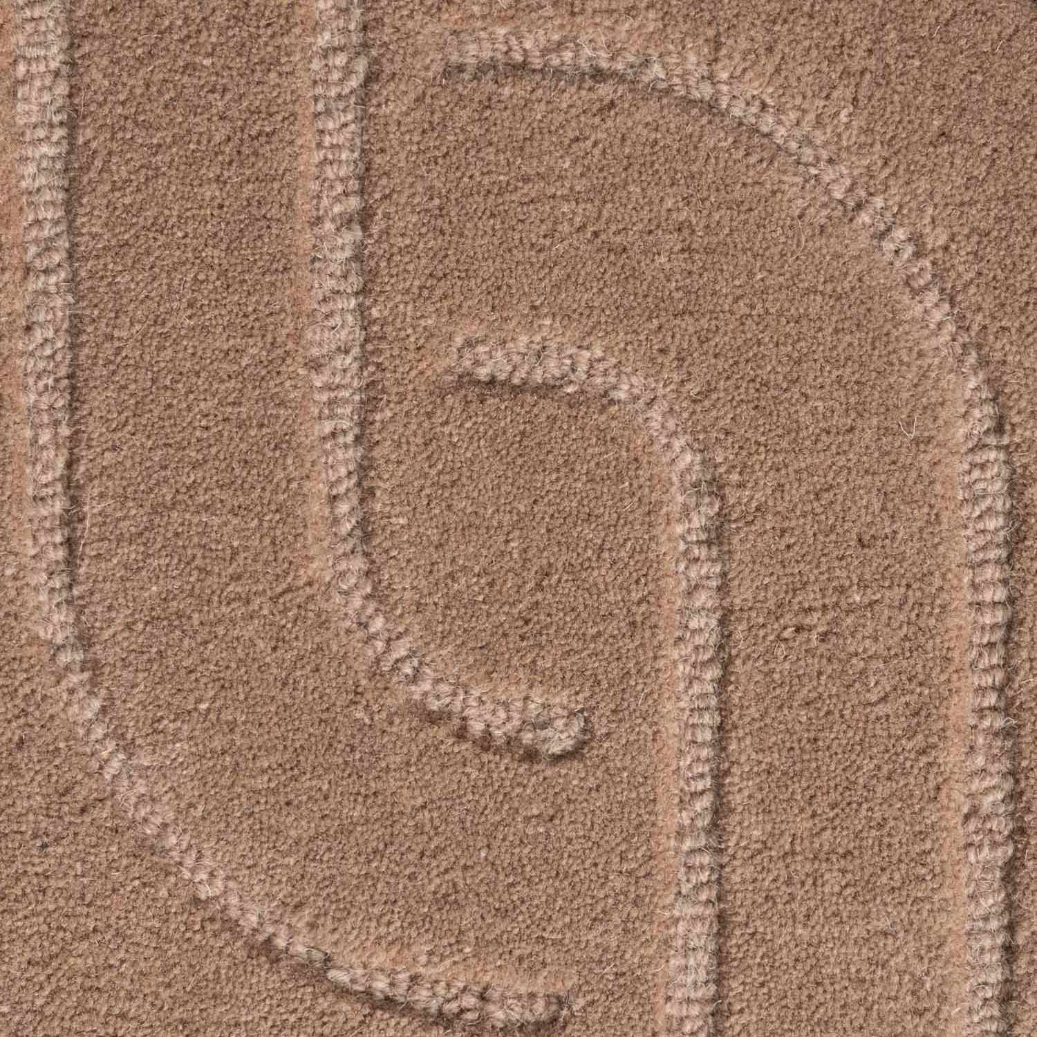 Close-up of a textured brown surface with a pattern
