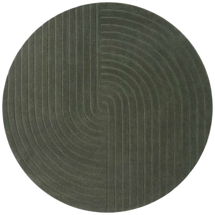 Round green rug with a textured pattern on a white background