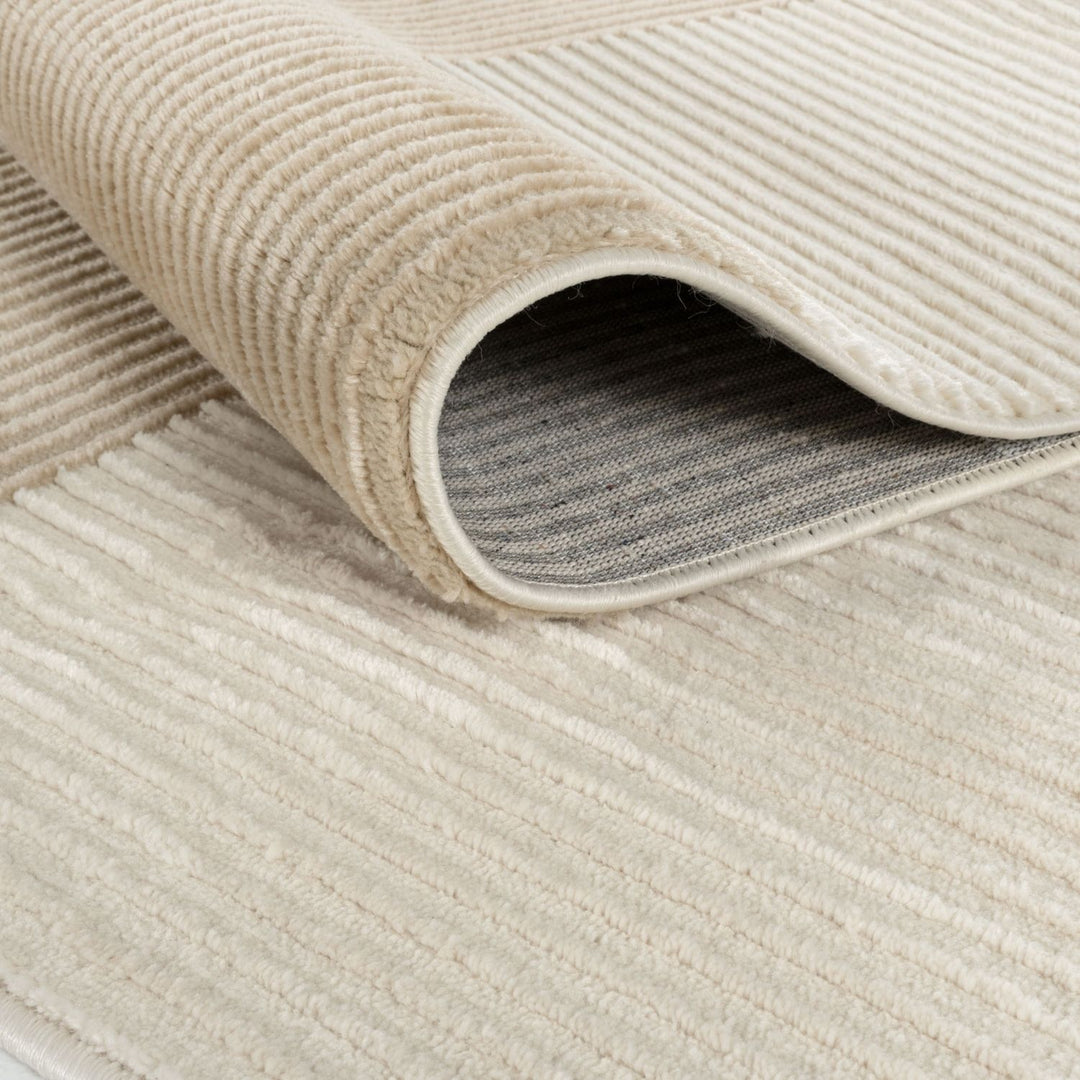 Sync Beige Rug Geometric design textured pile, stain-resistant.