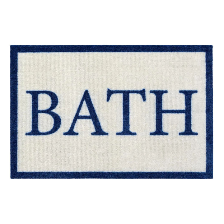 Rectangular bath mat with 'BATH' text in blue on a white background