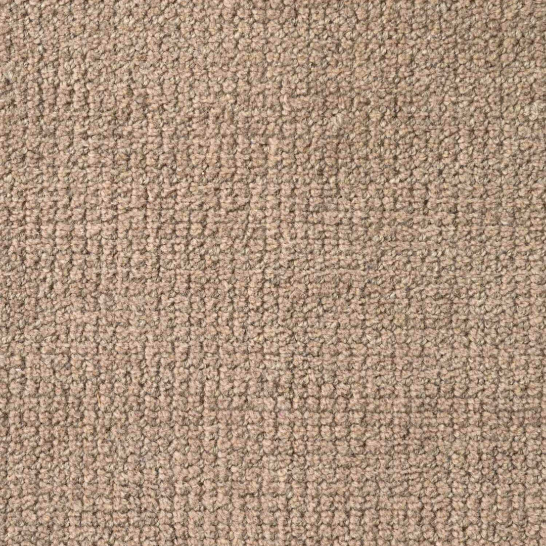 Close-up of beige carpet texture