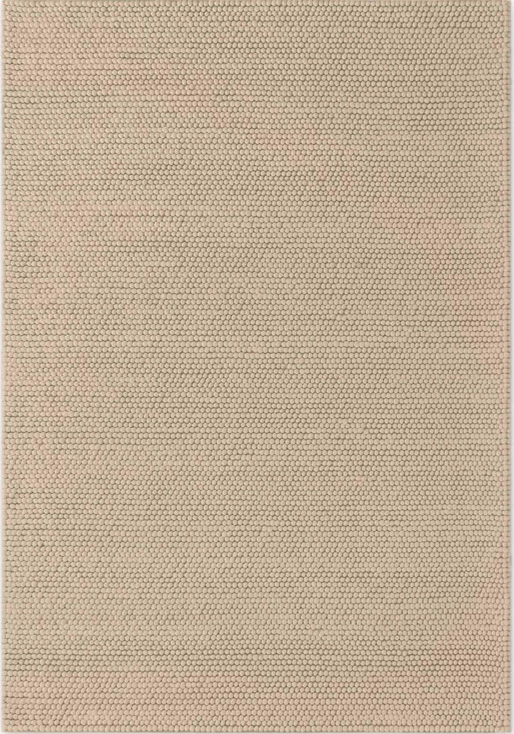 Beige textured rug with a subtle pattern