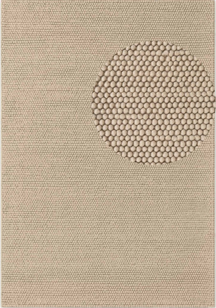 Beige rug with a central circular pattern