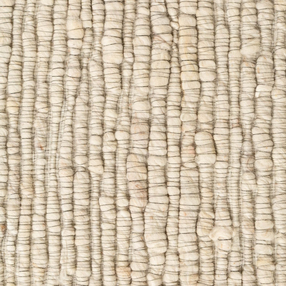 Close-up of textured beige fabric