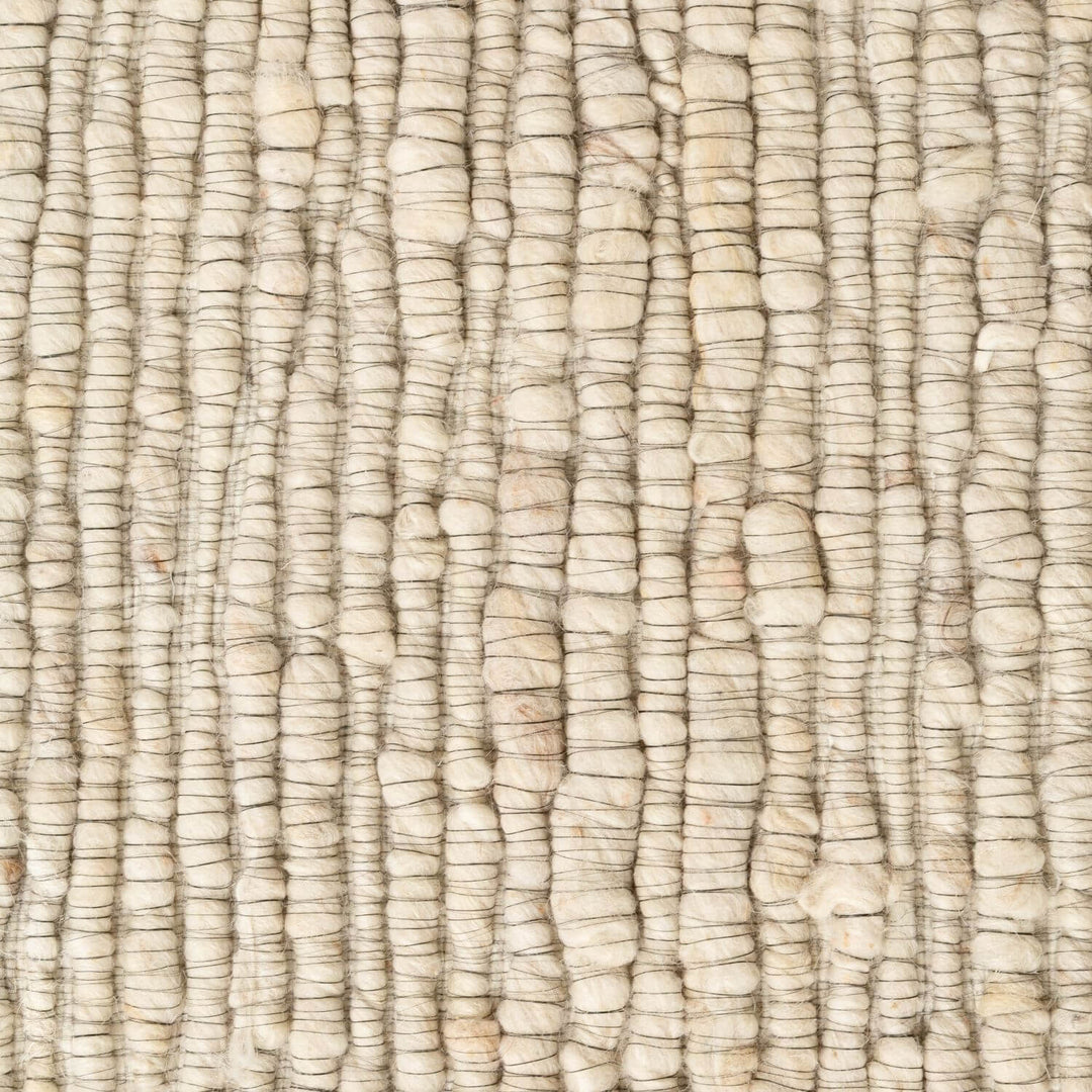 Close-up of textured beige fabric