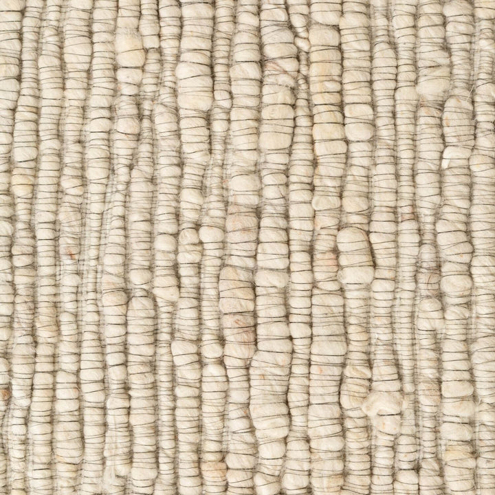 Close-up of textured beige fabric