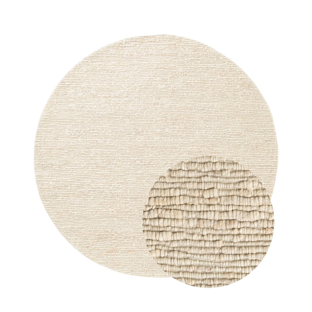 Round beige rug with textured pattern on a white background