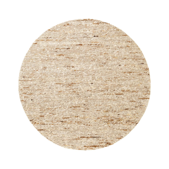 Round beige rug with a textured pattern on a white background