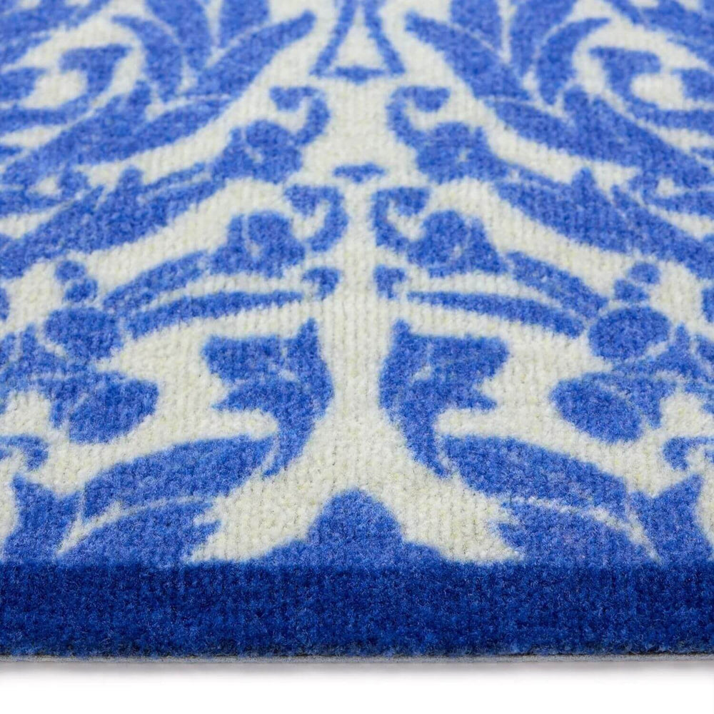 Close-up of a blue and white patterned rug