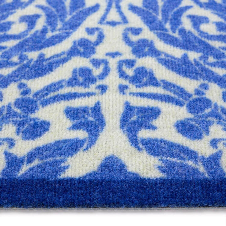 Close-up of a blue and white patterned rug