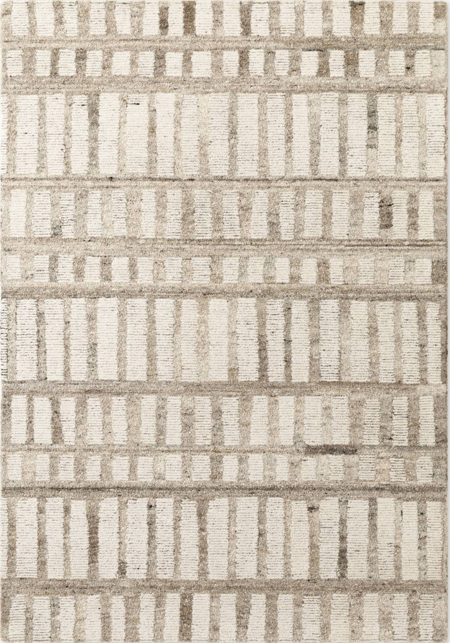Textured area rug with a geometric pattern in neutral tones