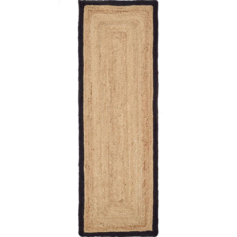 Beige jute rug with black border on a white background