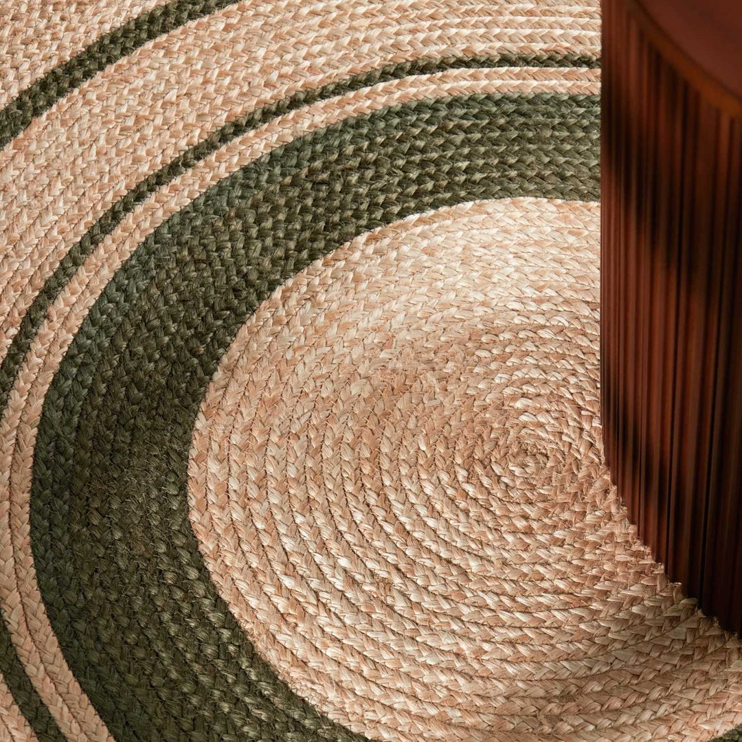 Close-up of a braided rug with concentric circular pattern