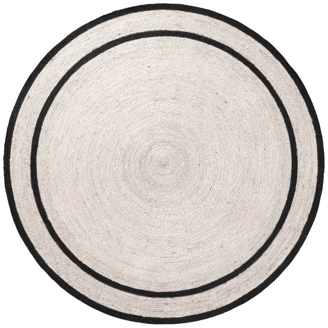 Round rug with black border on a white background