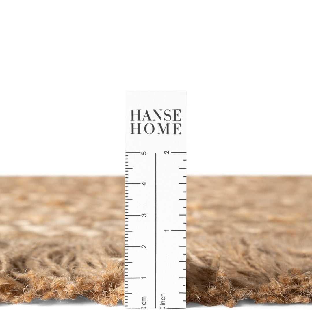 Hanse Home rug with a measurement scale on a white background