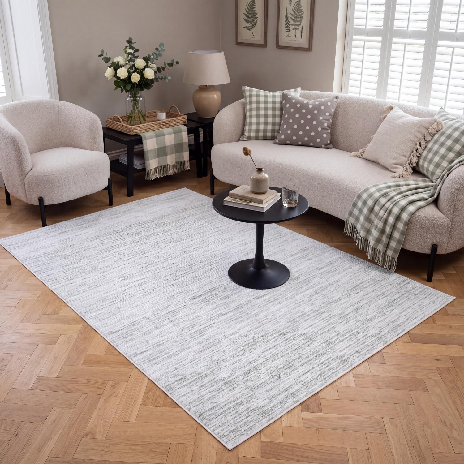 carmel green white rug, lifestyle image, durable soft pile, cosy warm living room, striped design rug, stain-resistant.