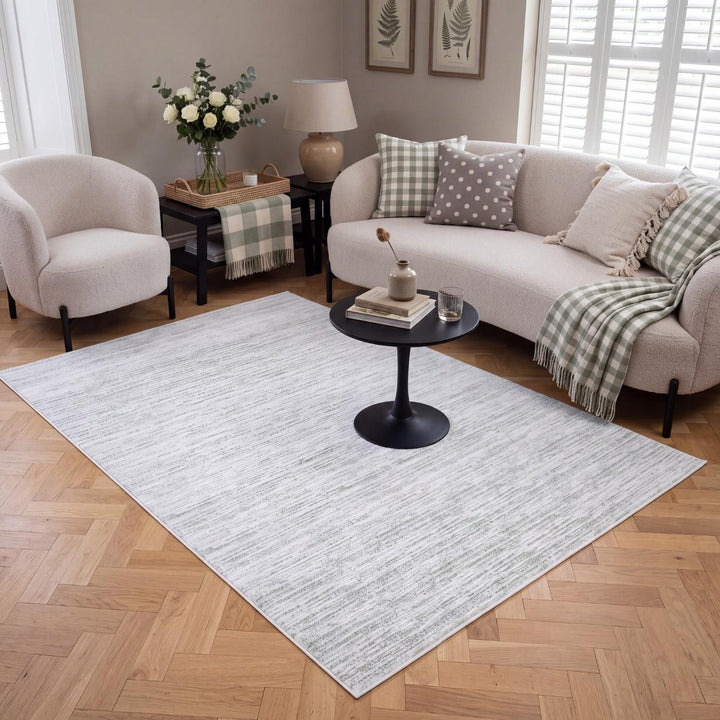carmel green white rug, lifestyle image, durable soft pile, cosy warm living room, striped design rug, stain-resistant.