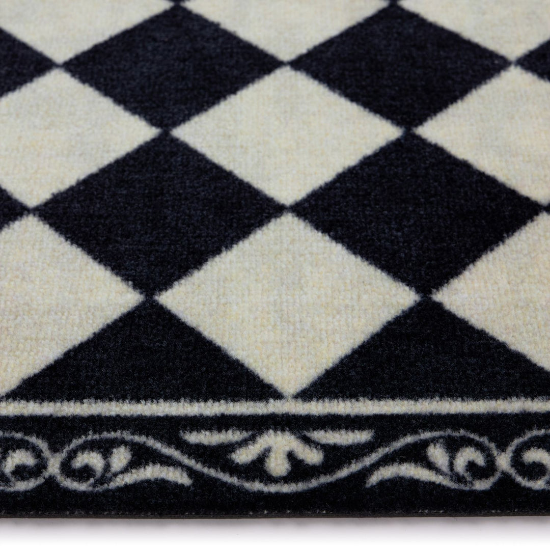 Close-up of a black and white checkered pattern with decorative border