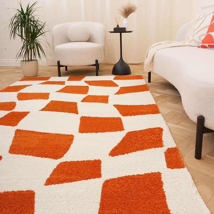Checkered design rug orange and white colour, non-shed.