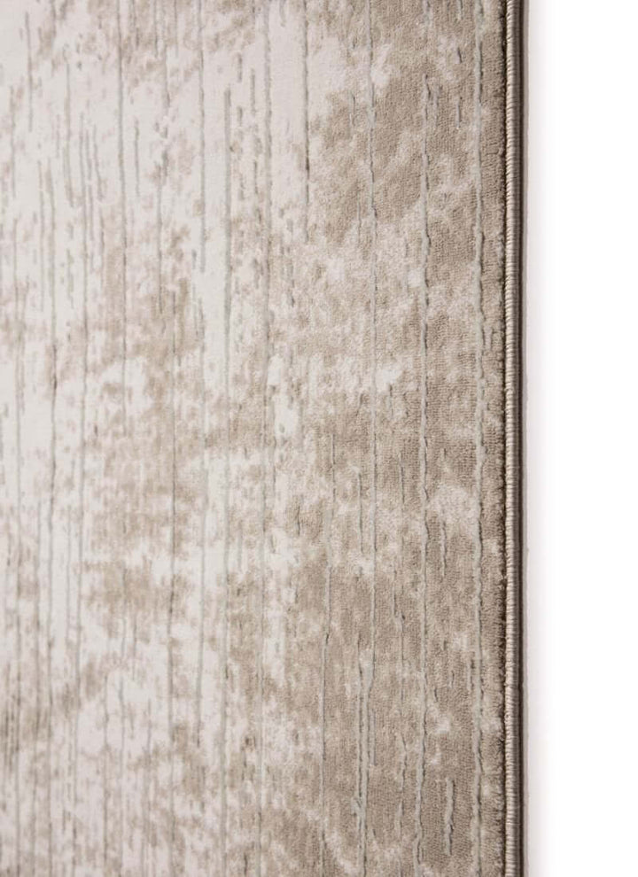 Abstract geometric rug in neutral tones of beige with a soft, textured surface for eco-conscious decor.