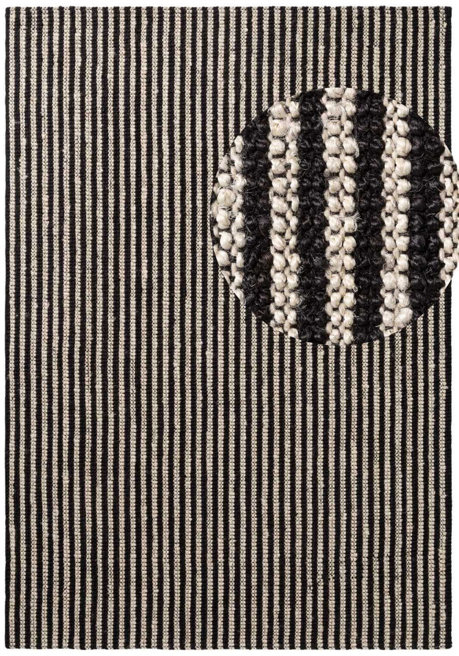 Textile patch with a circular design featuring three horizontal stripes on a striped background